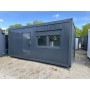 Contenedor habitable de 6,00 x 3,00 m con cocina americana, aseo y ducha.